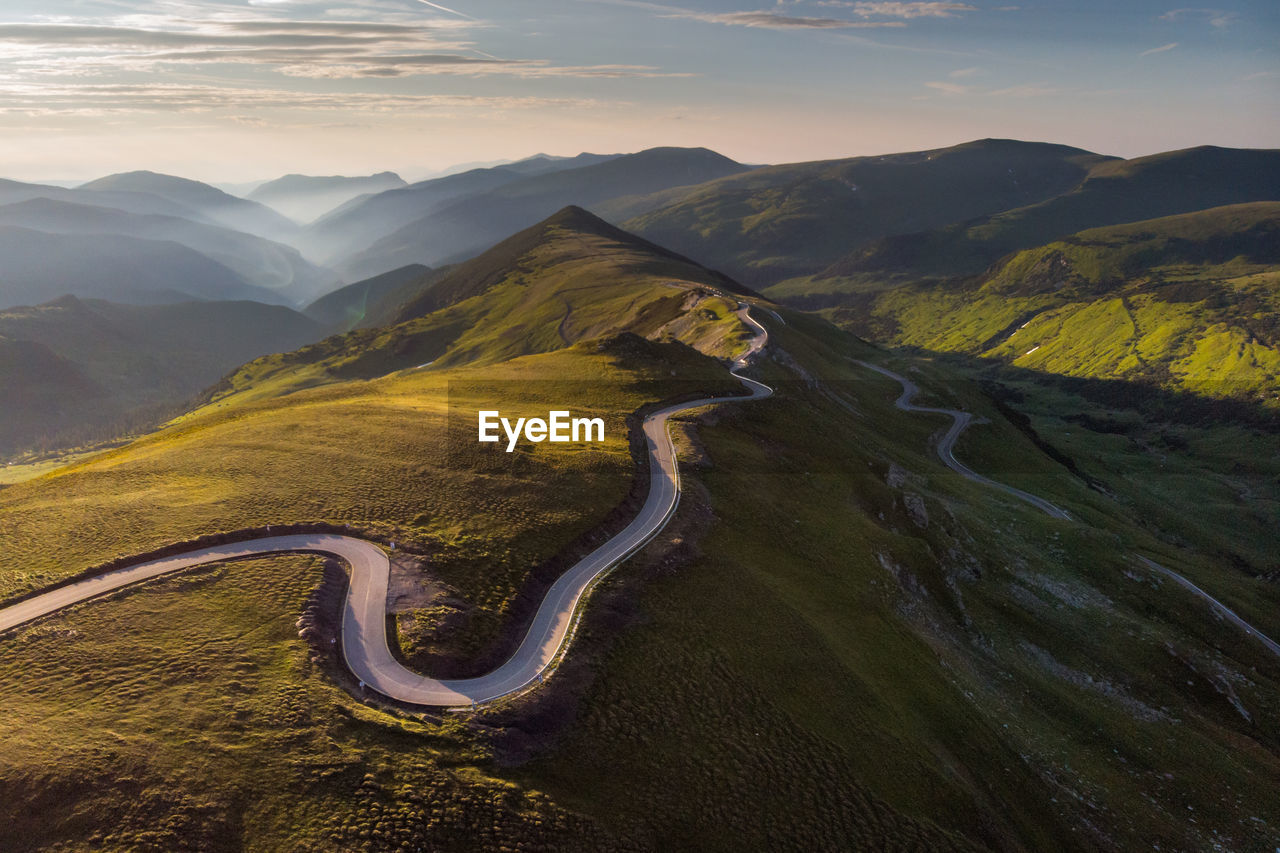 Summer aerial view of transalpina mountain road, at sunrise