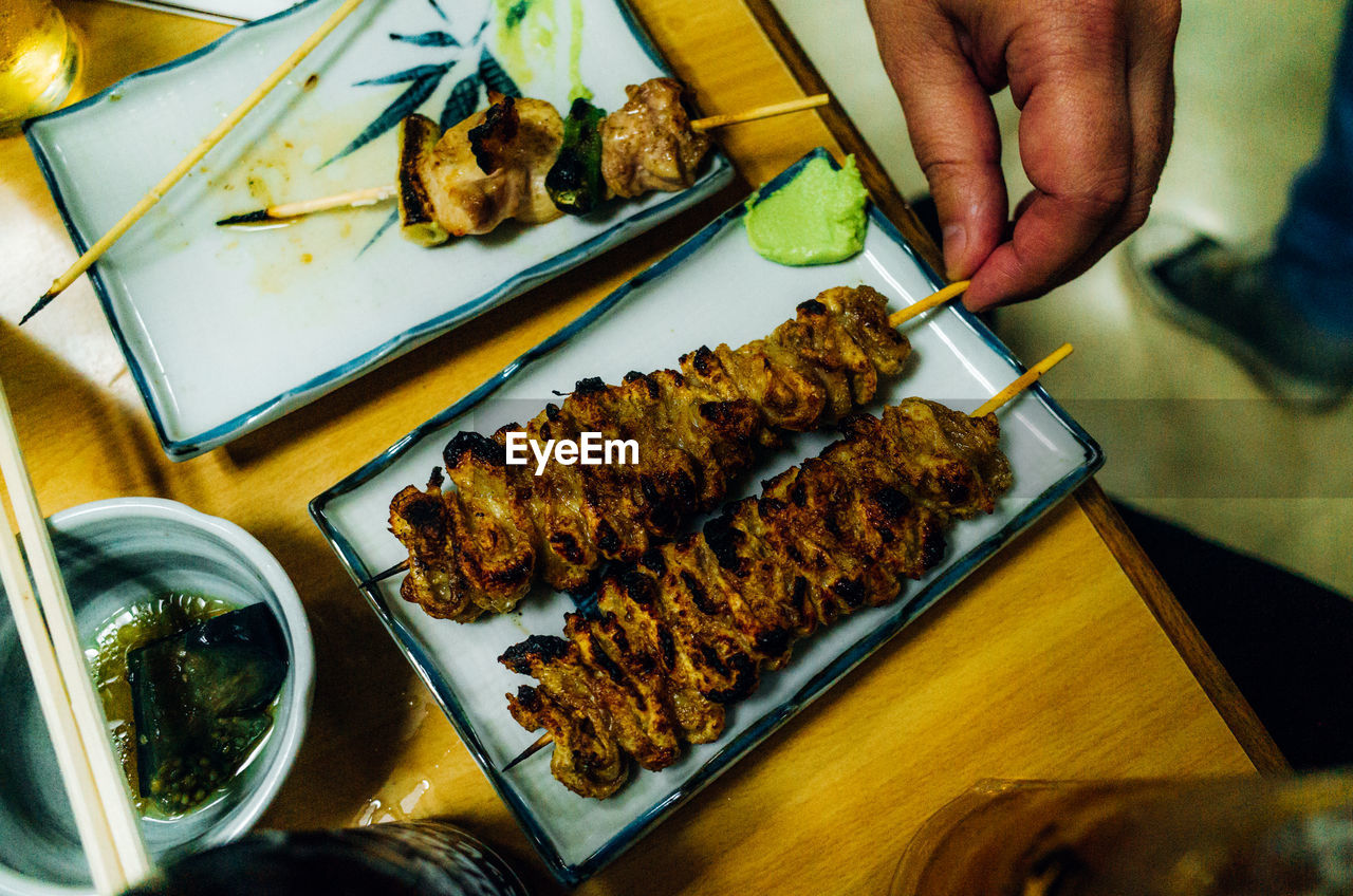 Directly above shot of person having food on table