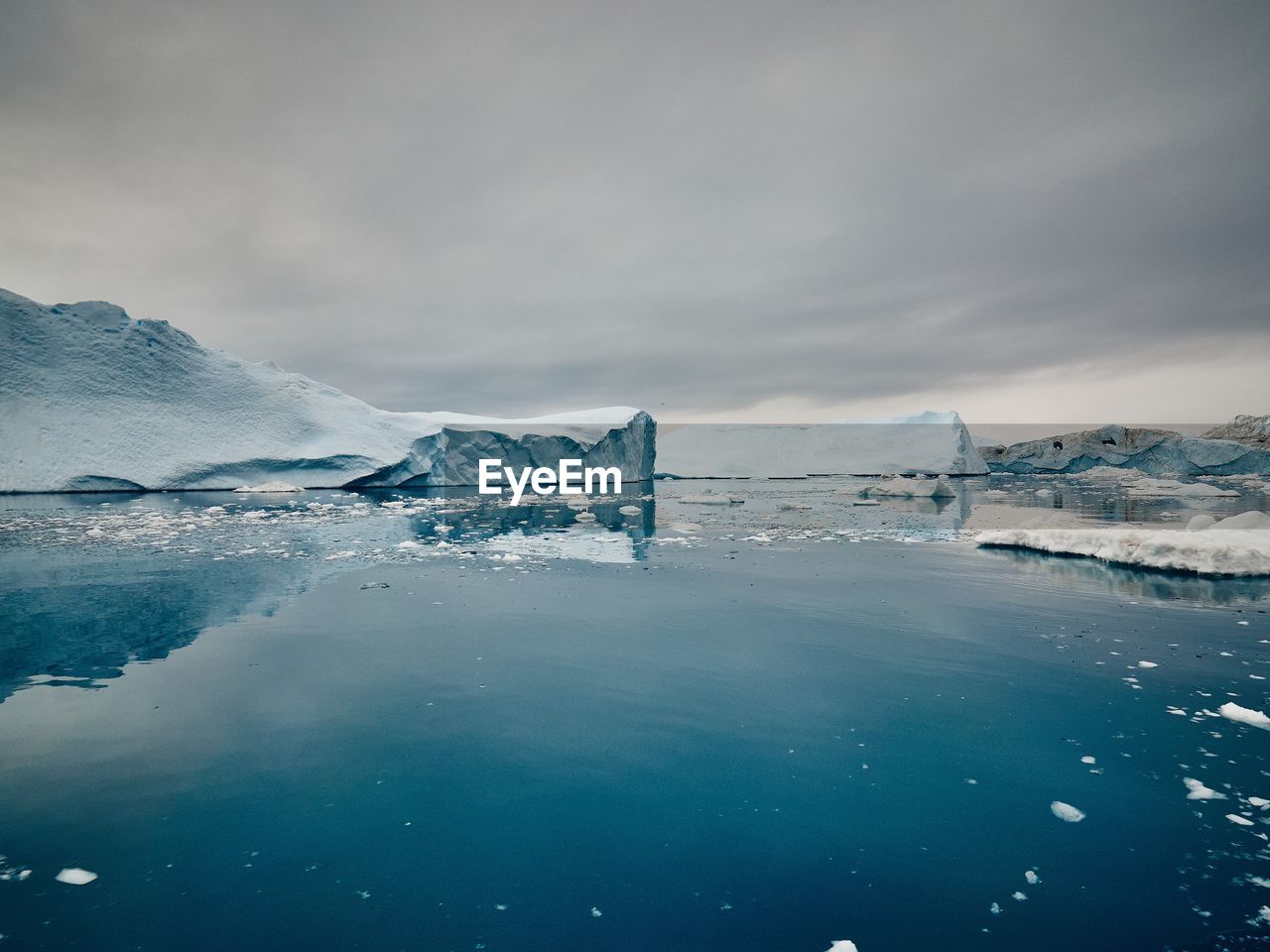 Scenic view of frozen lake against sky