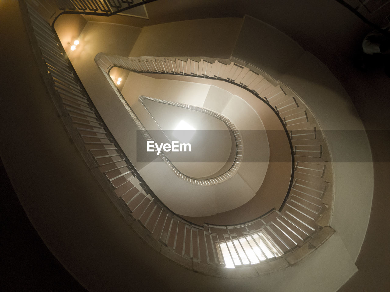 LOW ANGLE VIEW OF SPIRAL STAIRCASE