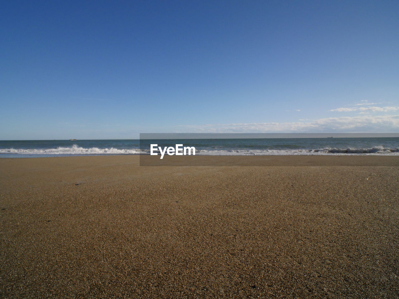 VIEW OF BEACH AGAINST CLEAR SKY