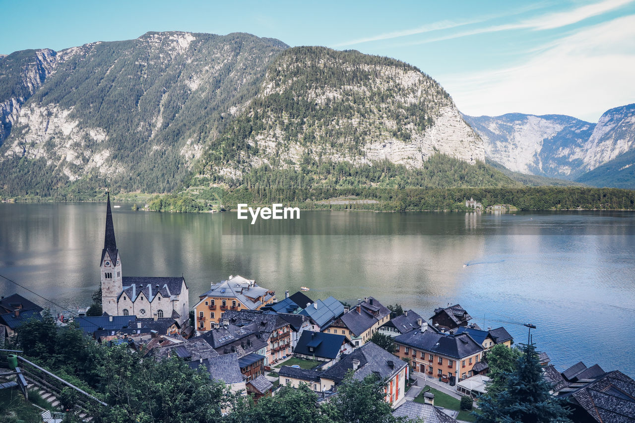 Picturesque village of hallstatt and its adjacent lake is the largest tourist attraction in austria
