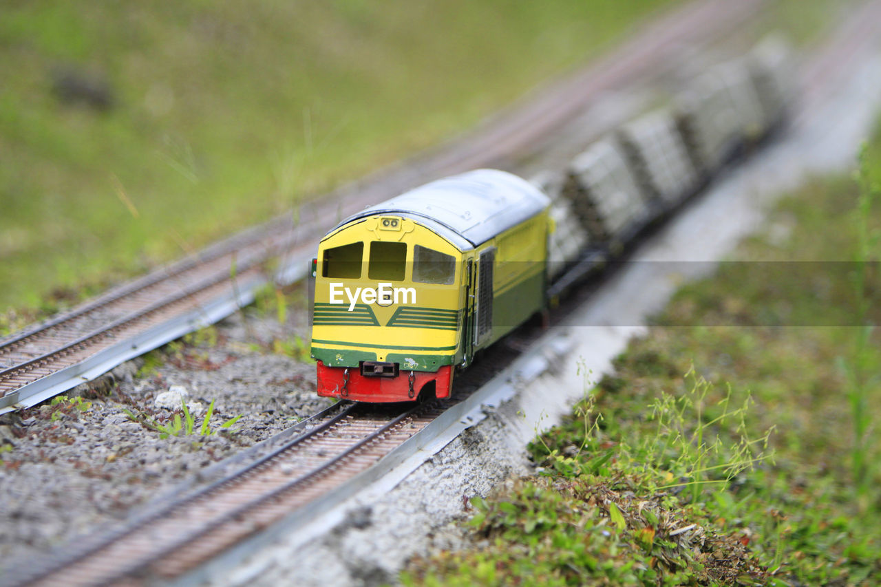 HIGH ANGLE VIEW OF TOY TRAIN
