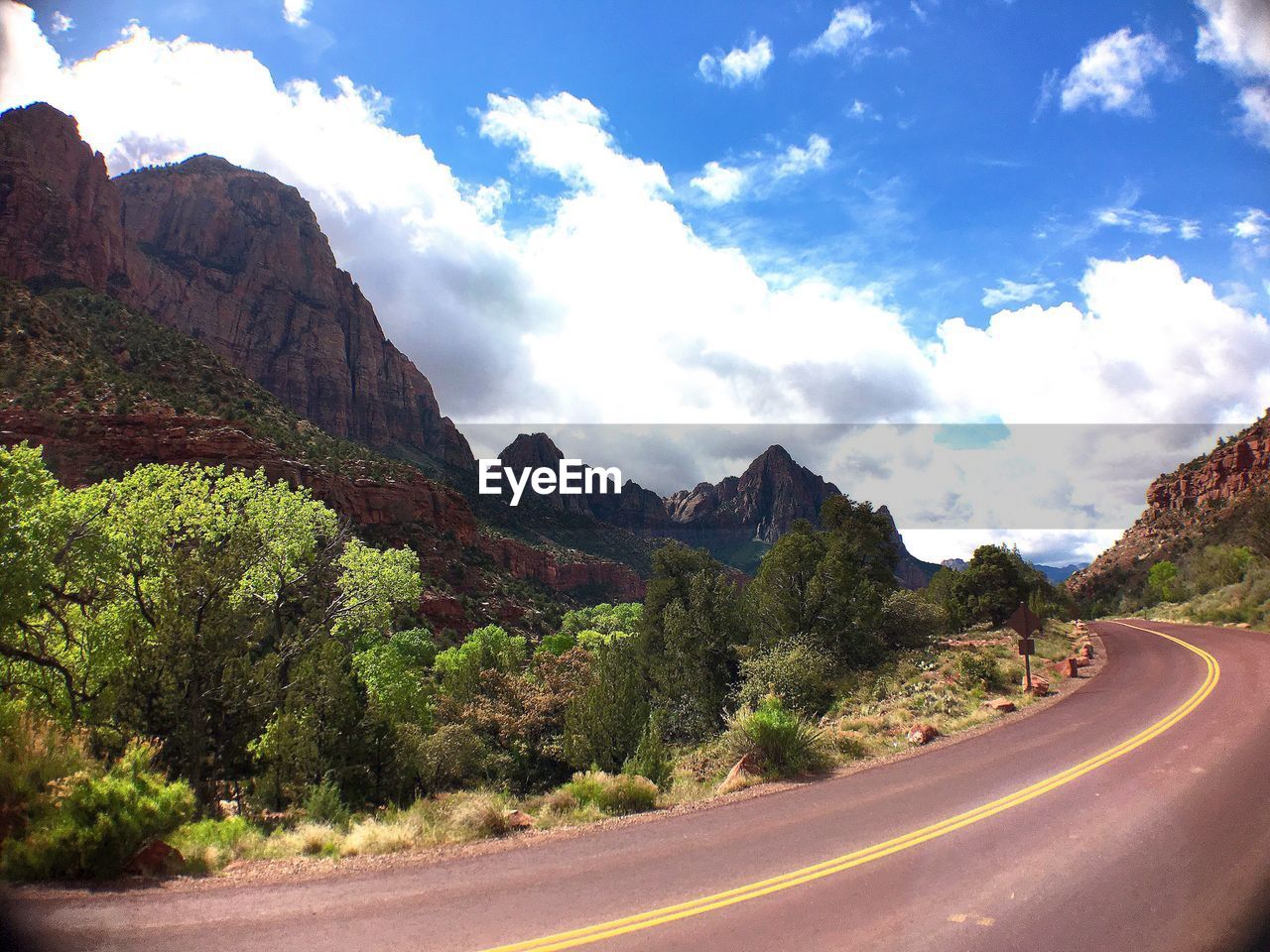 ROAD PASSING THROUGH MOUNTAINS