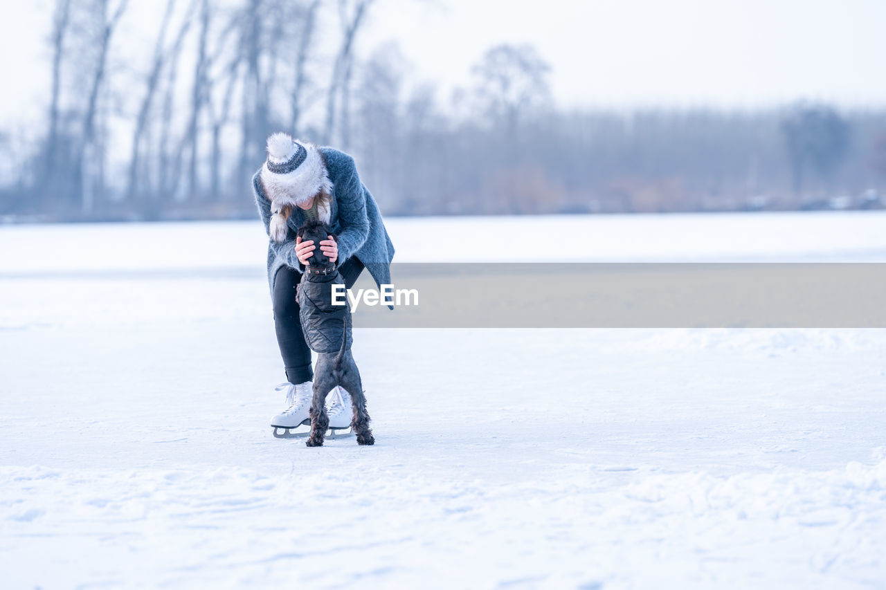 Full length of man on snowy field