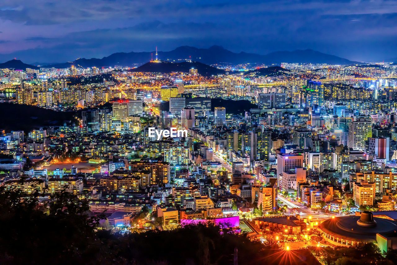 Illuminated cityscape at night