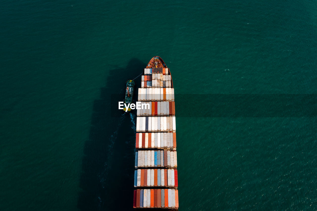 Aerial top view container cargo ship in import export business service commercial trade logistic 