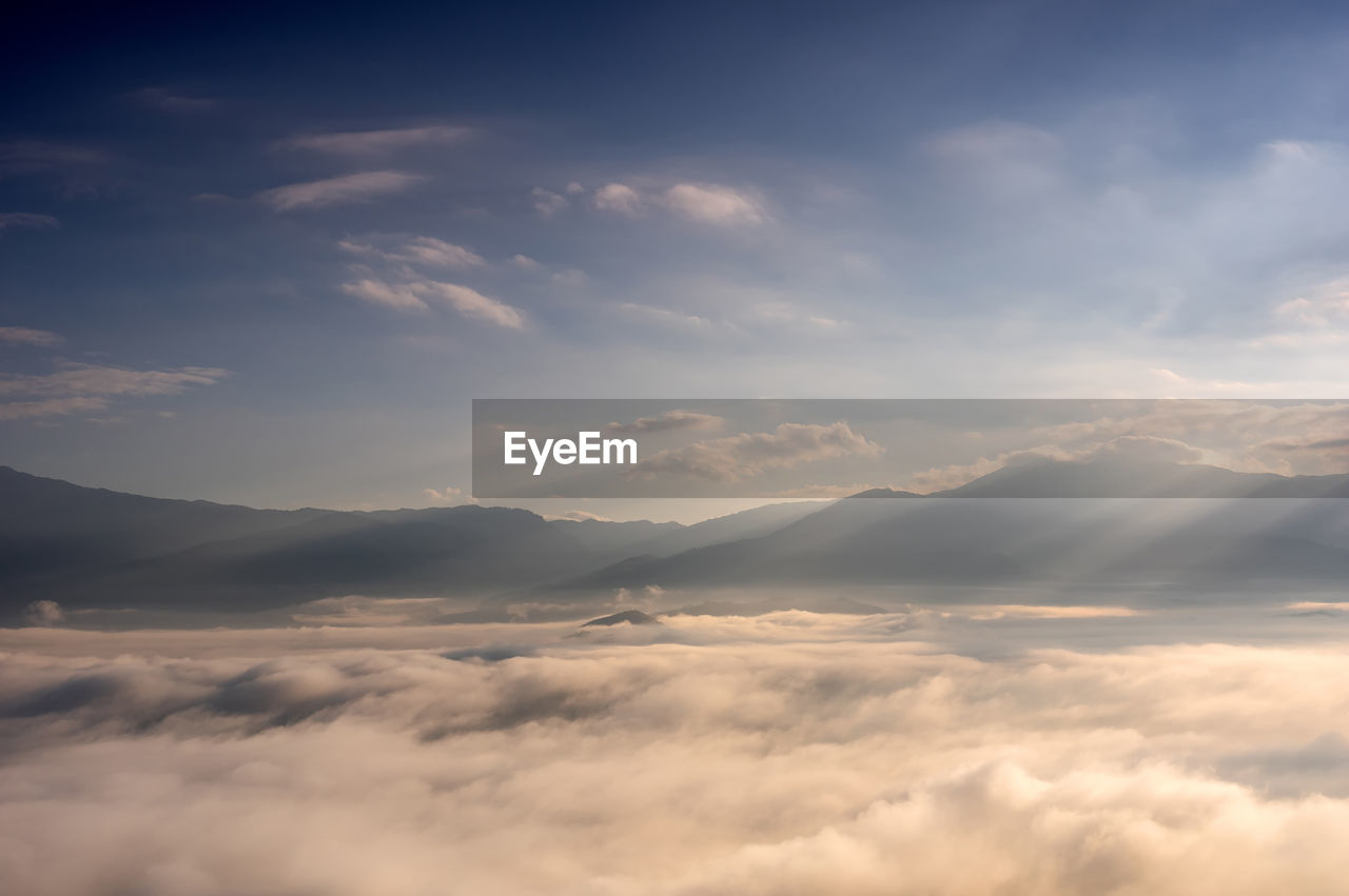 Aerial view beautiful of morning scenery sea of cloud and the fog flows on high mountains.