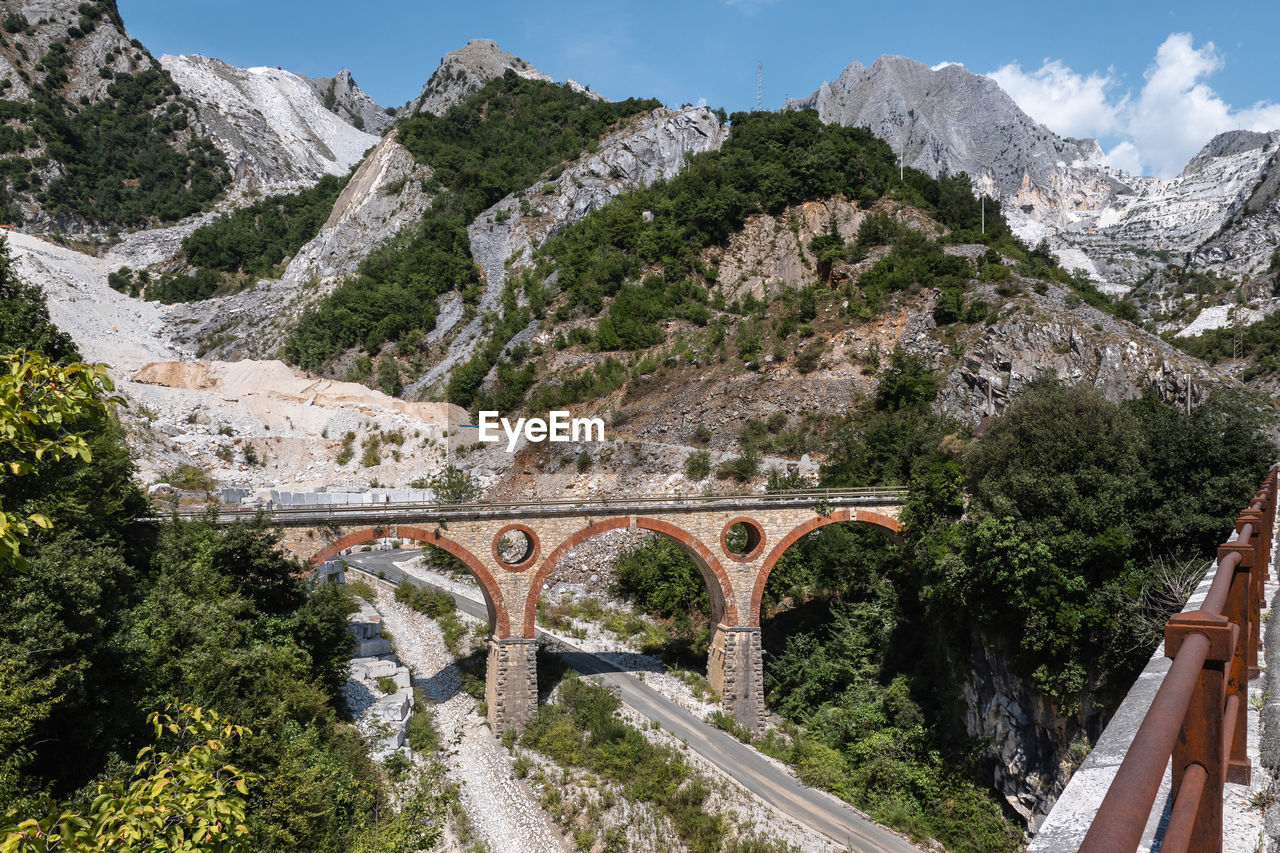 Bridge of vara in carrara, site of the old private marble railway - tuscany, italy.