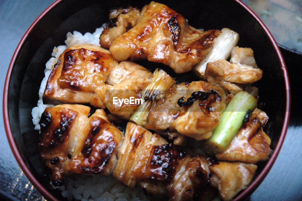 High angle view of chicken yakitori in bowl on table