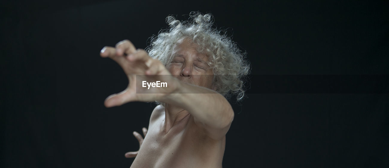 Close Up Of Woman Reaching Out Against Id 104605348