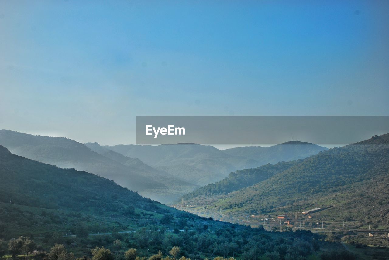 Scenic view of mountains against clear sky