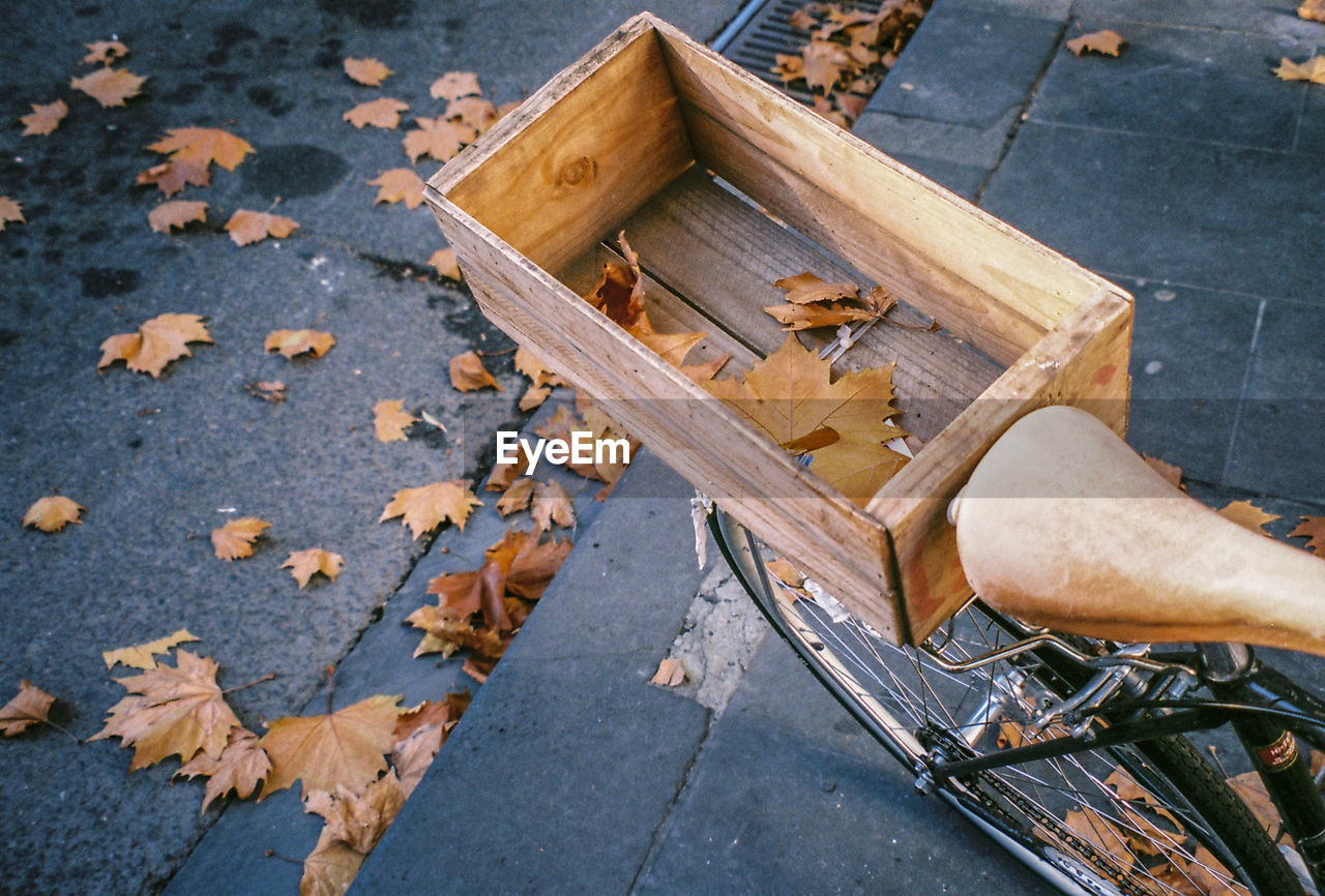 High angle view of wooden box on bicycle during autumn