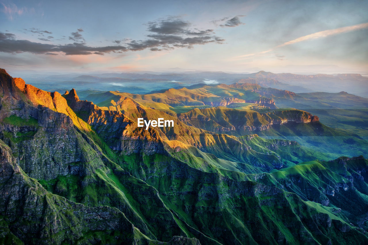 Scenic view of mountains against sky during sunset