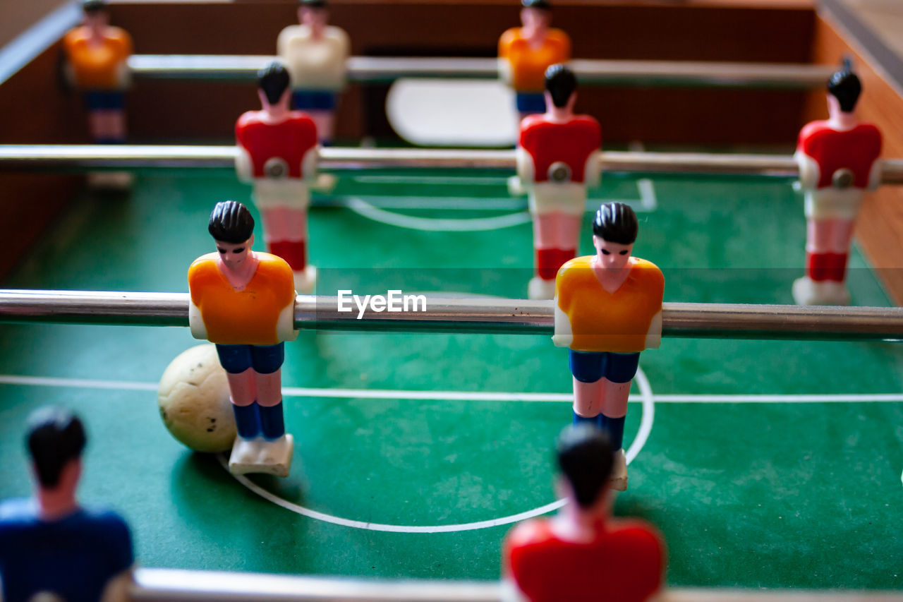 Close-up of small figurine on table