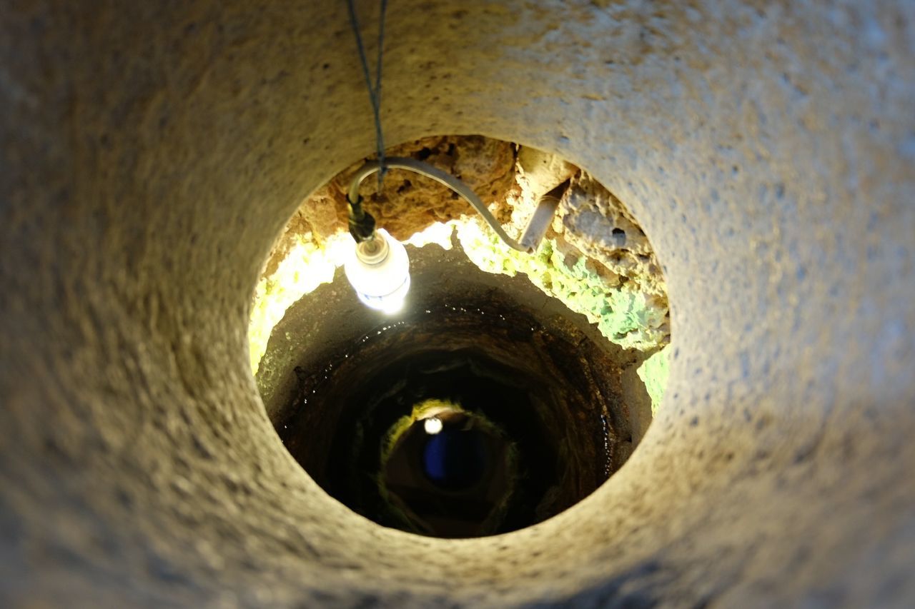 High angle view of electric light in well