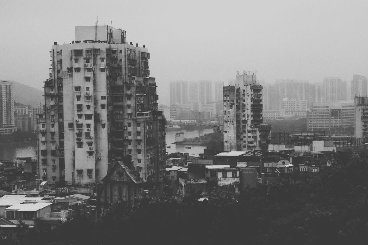 Buildings and houses in foggy weather
