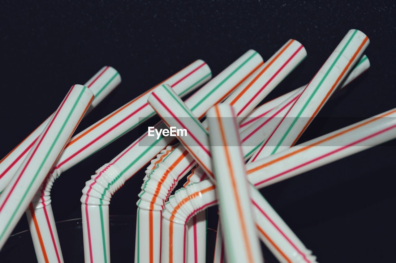 Low angle view of multi colored straws 