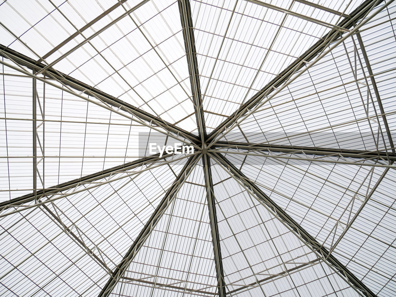 Full frame background of modern roof structure with welded pipes