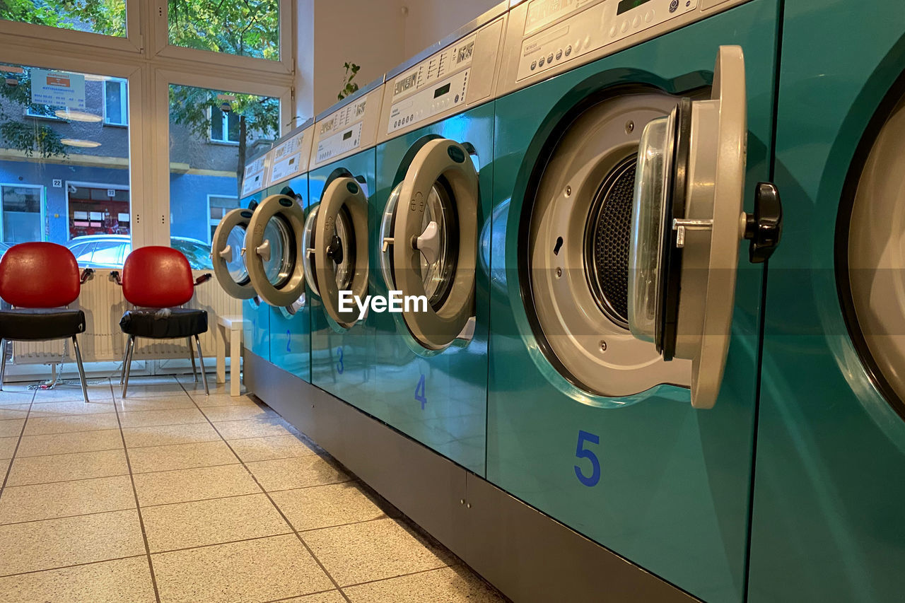 washing machine, appliance, household equipment, laundry, machinery, laundry room, clothes dryer, laundromat, room, dryer, domestic life, lifestyles, cleaning, washing, indoors, major appliance, hygiene, no people, convenience, utility room, home appliance, housework, flooring, in a row, drying