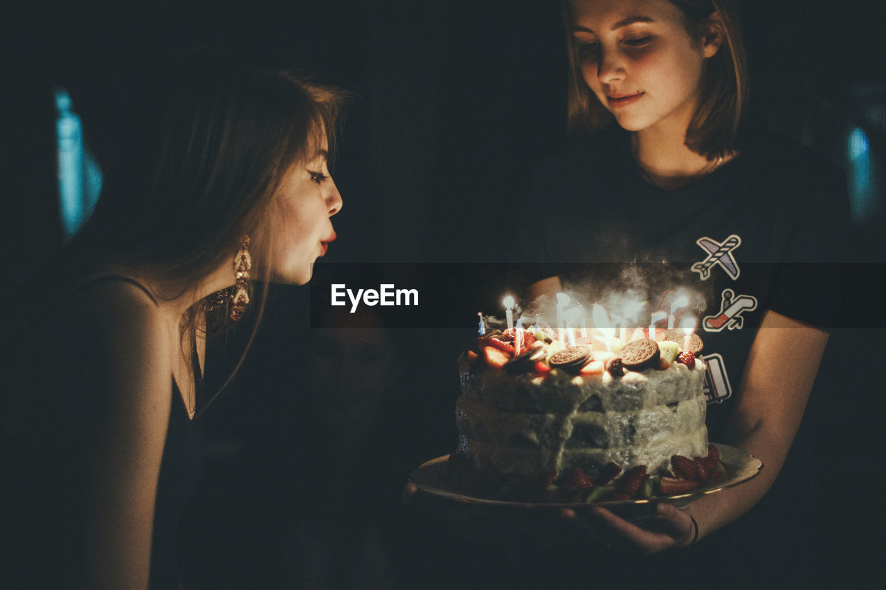Birthday cake in dark room