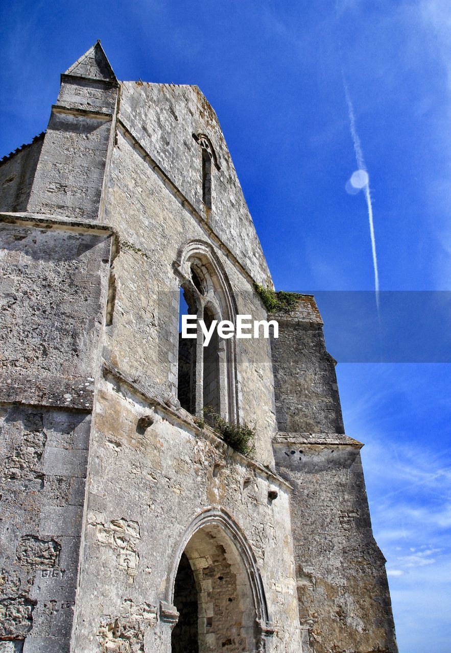 LOW ANGLE VIEW OF BELL TOWER AGAINST SKY