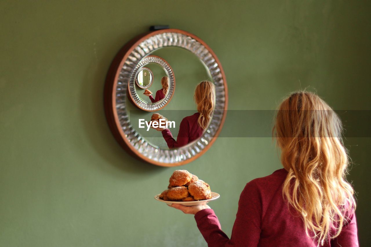 High angle view of woman holding food