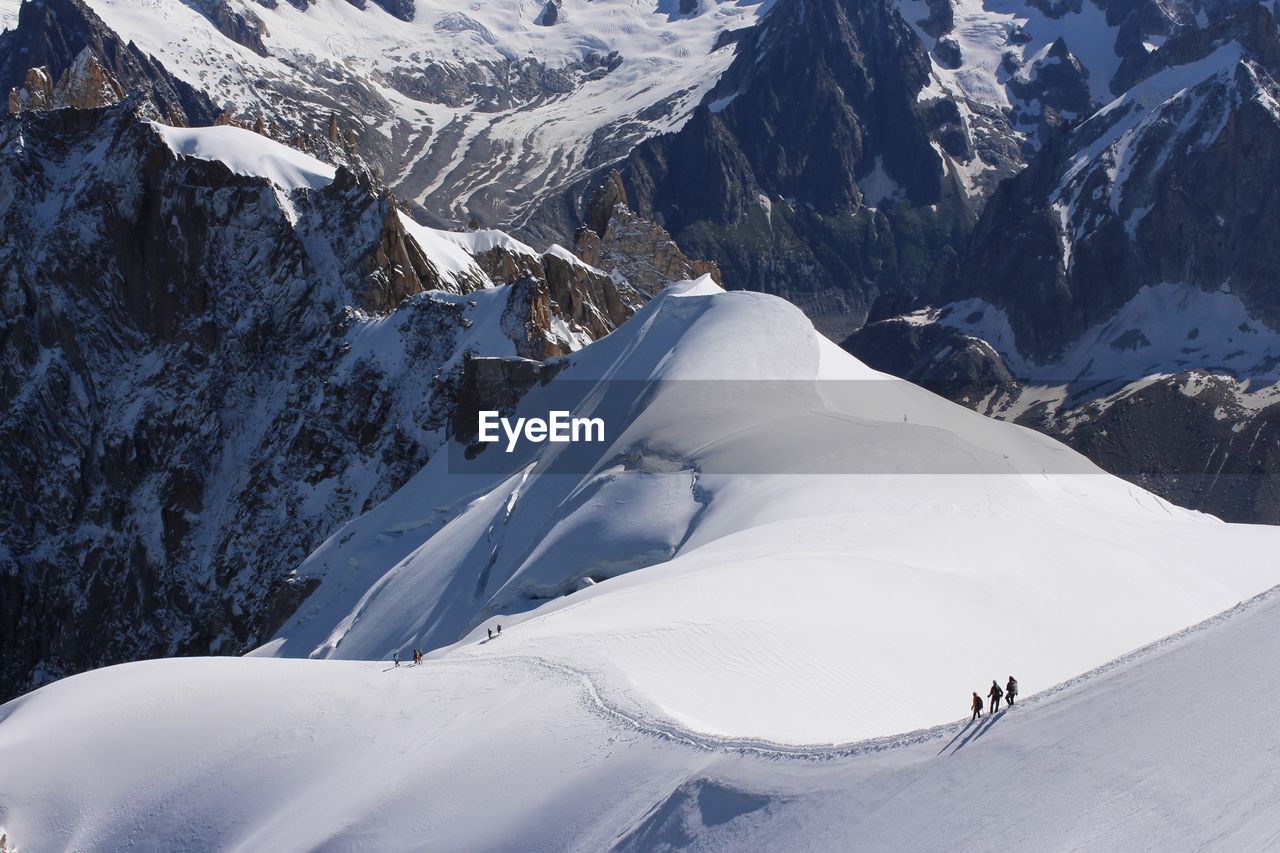 High angle view of people skiing on mont blanc during winter