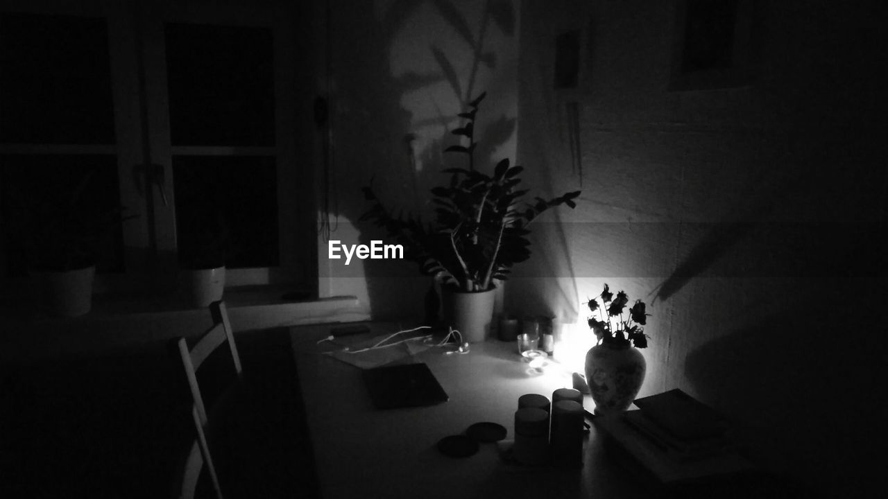 ILLUMINATED TABLE AT NIGHT