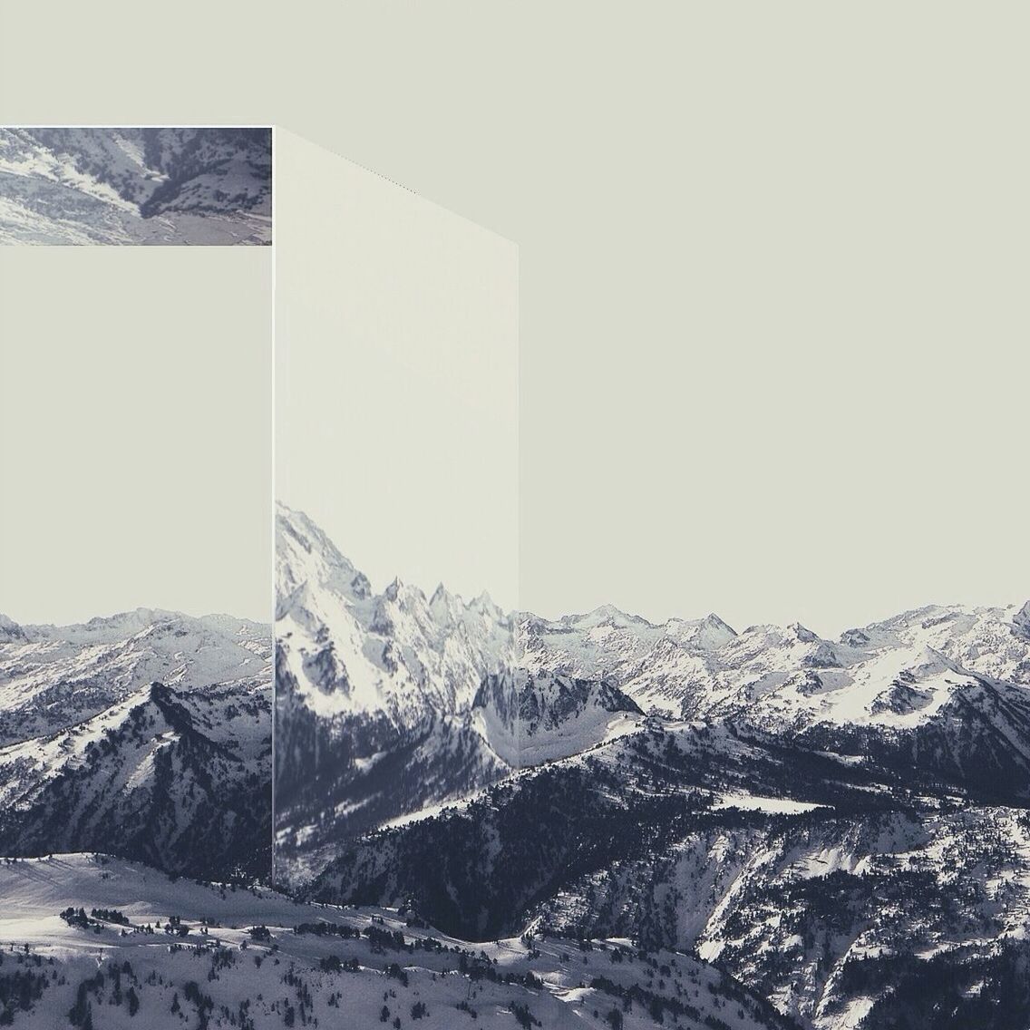SCENIC VIEW OF SNOW COVERED MOUNTAINS