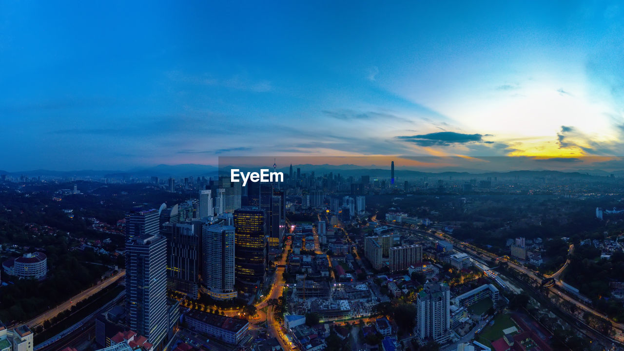 Panoramic aerial view of kuala lumpur cityscape during sunset