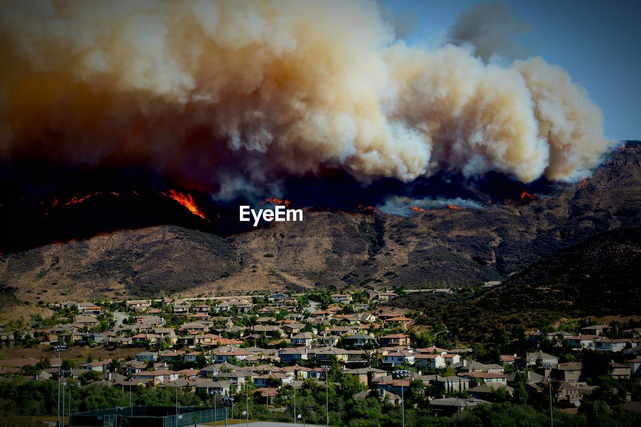 Smoke emitting from mountains during wildfire