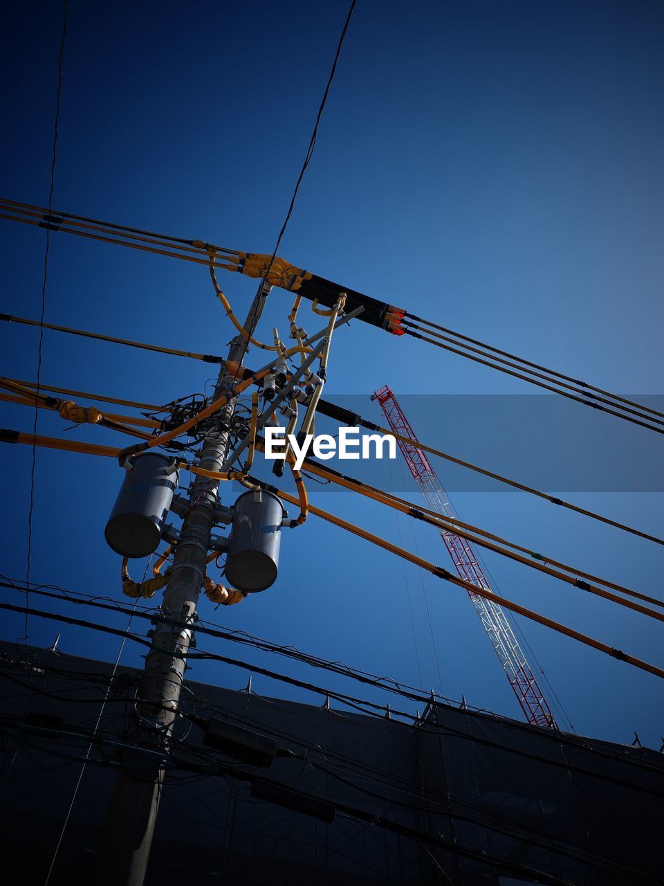 LOW ANGLE VIEW OF ELECTRICITY PYLON AGAINST SKY