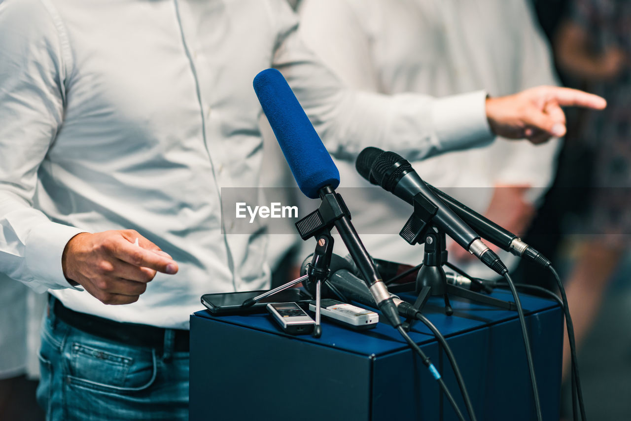 Midsection of businessman during conference