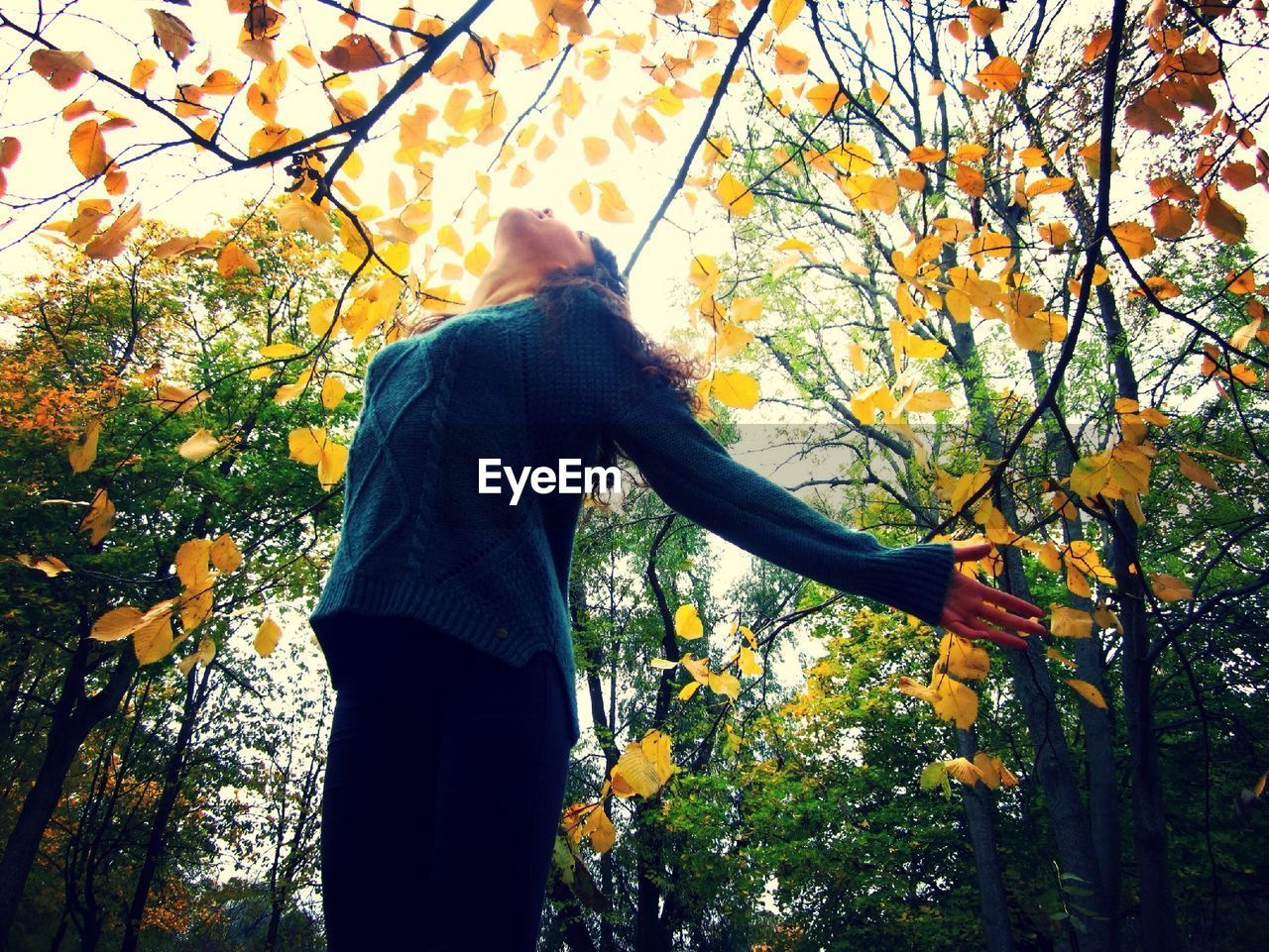Woman in autumn park