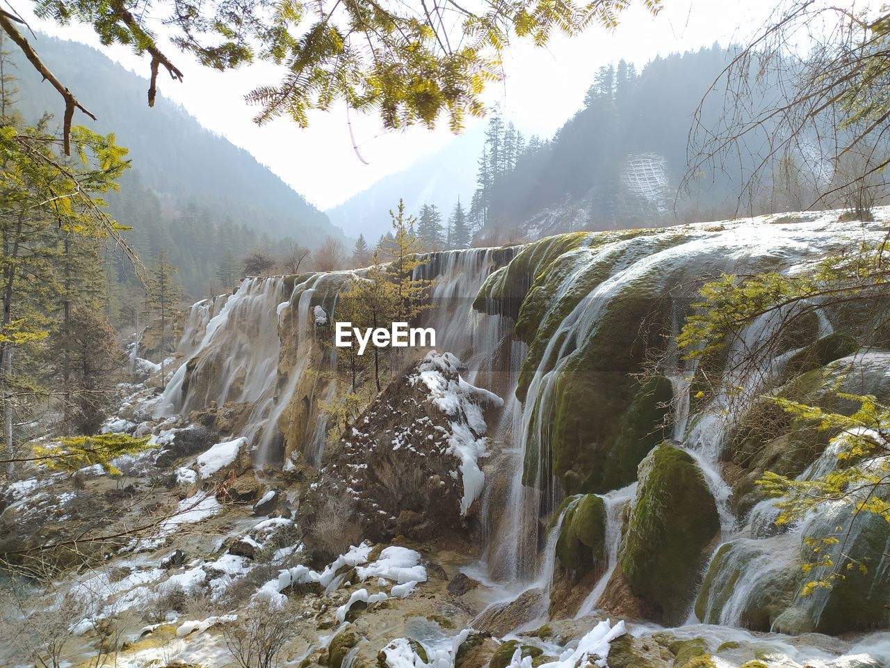 Beautiful view of waterfall in jiuzhaigou national park in china, the heaven on the earth with snow