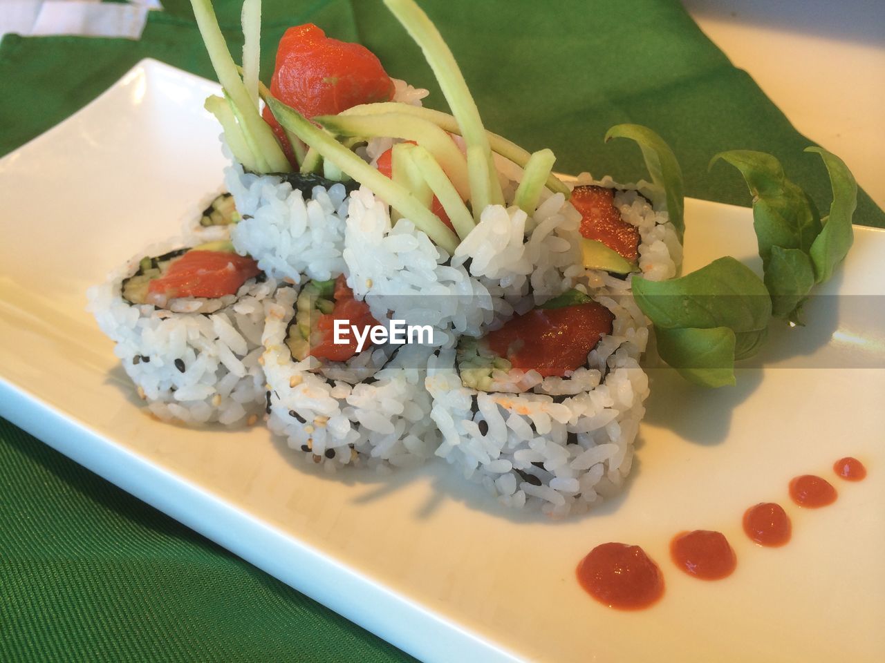 CLOSE-UP OF SUSHI SERVED IN TRAY