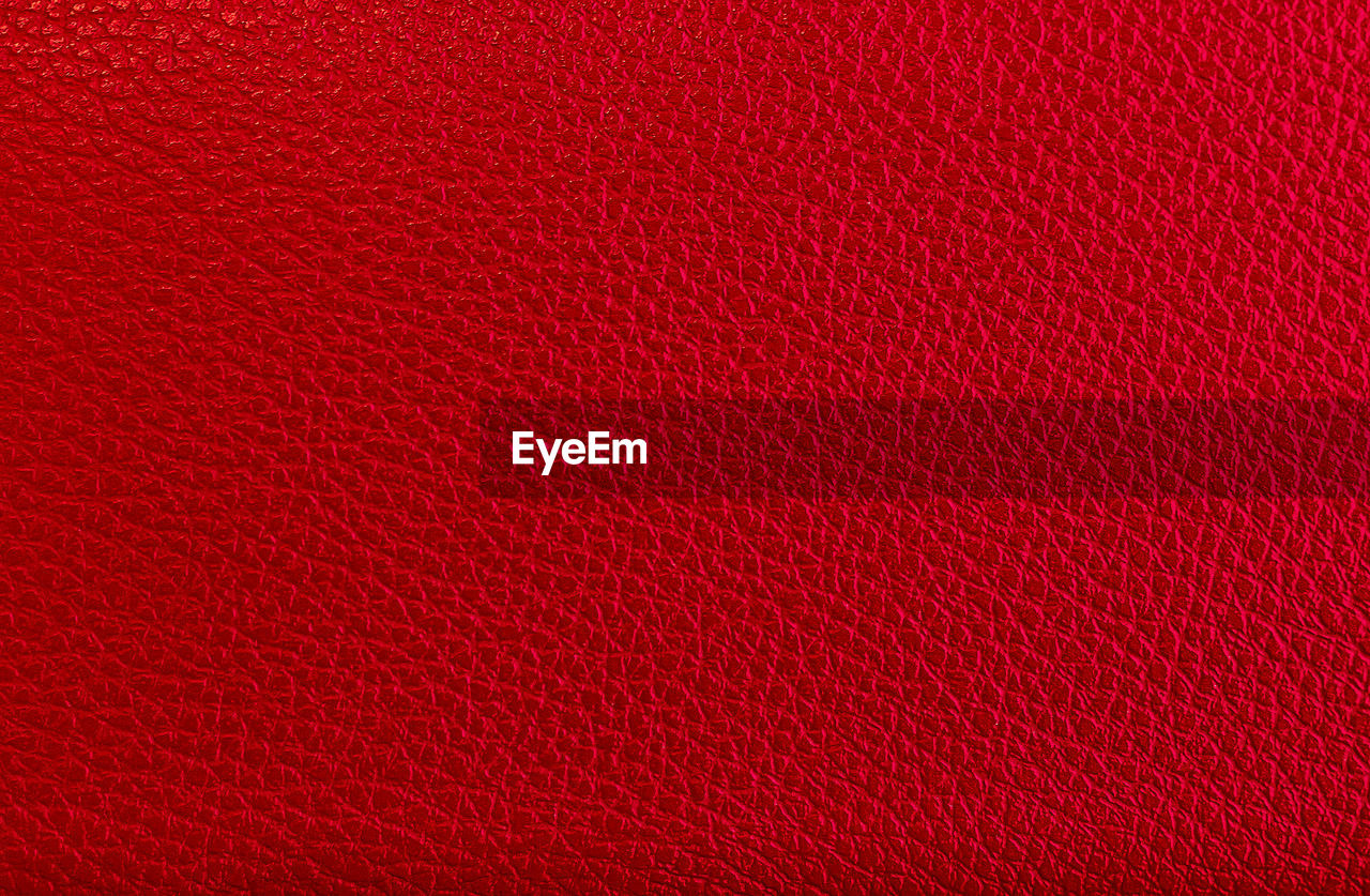 red, textured, backgrounds, full frame, textile, pink, maroon, pattern, close-up, no people, magenta, material, circle, flooring, abstract, orange, textured effect, macro, copy space, petal, extreme close-up, leather, indoors, line, font, rough