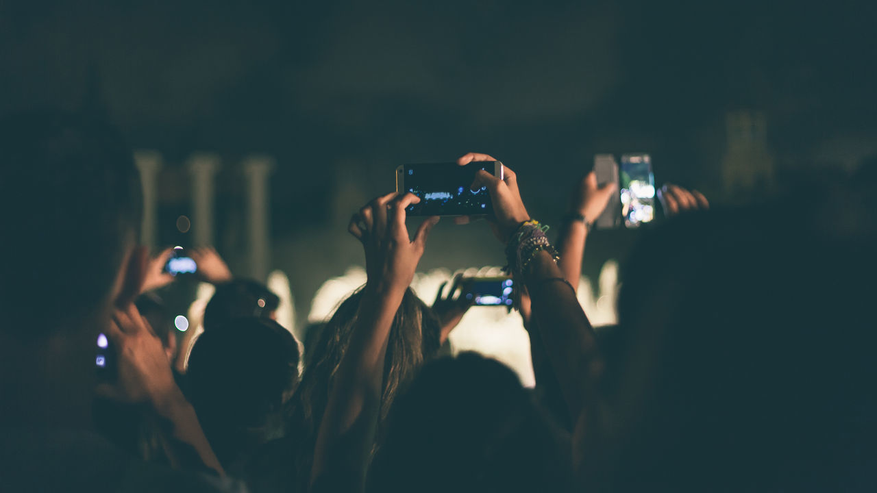 People recording concert with mobile phones | ID: 92710030