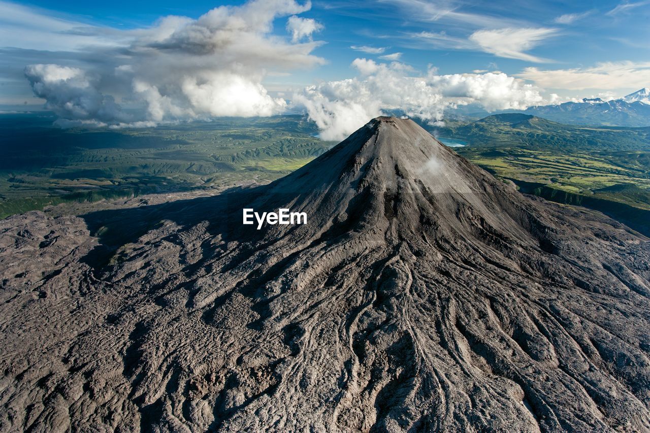 View of karymsky volcano  against sky