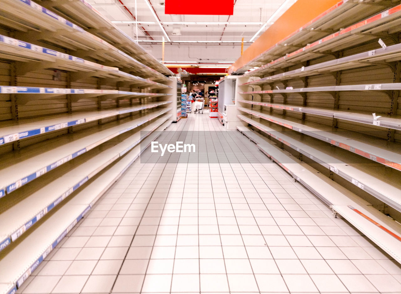 View of empty shelves in supermarket