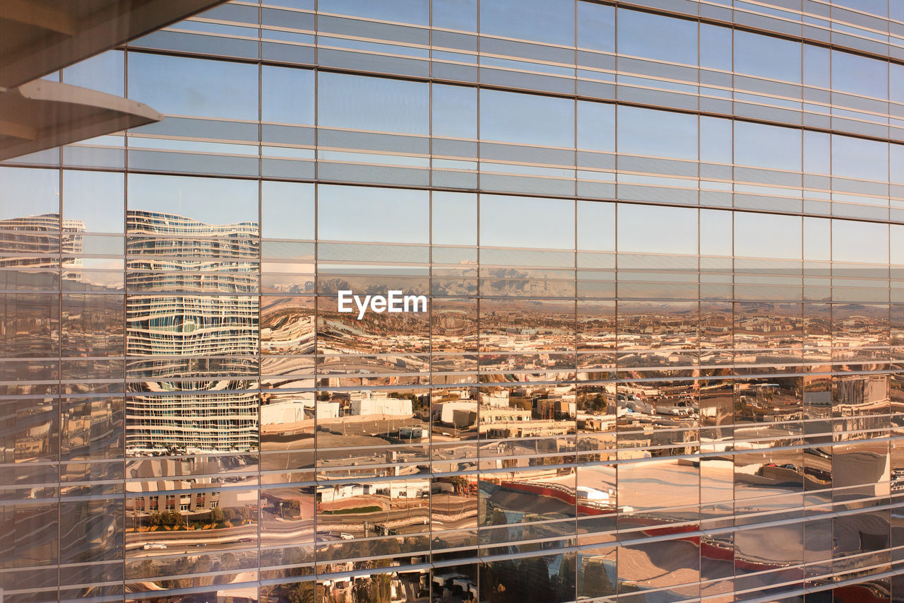 Full frame shot of city reflection in glass