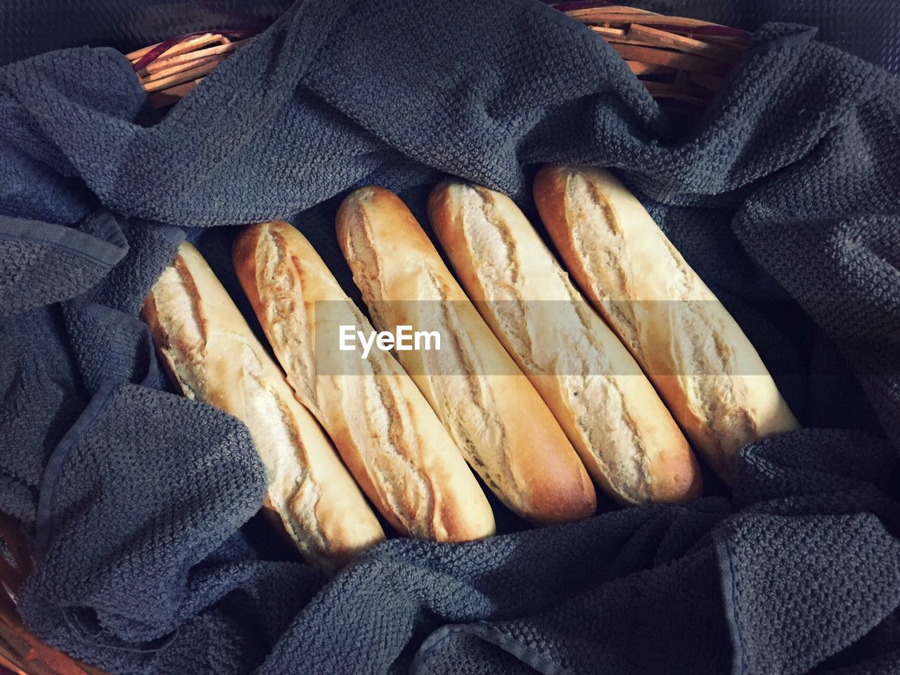 Close-up of baguette on fabric