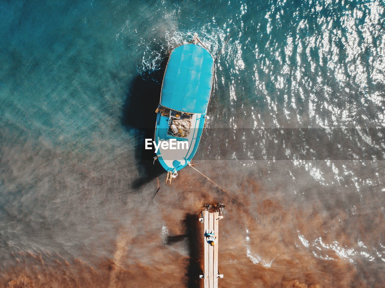 High angle view of boat moored on sea