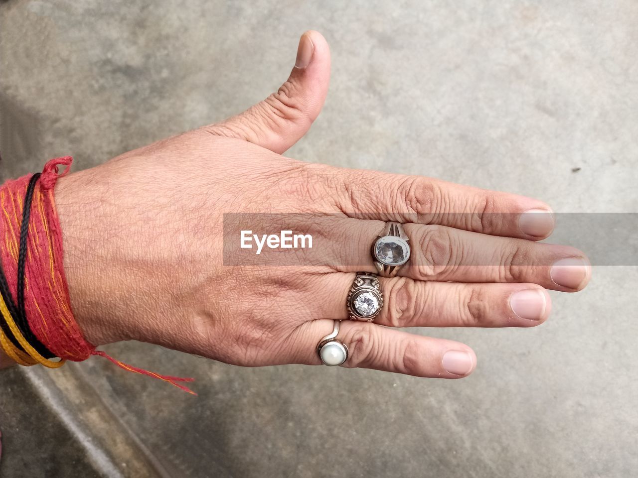 Close-up of hand wearing rings