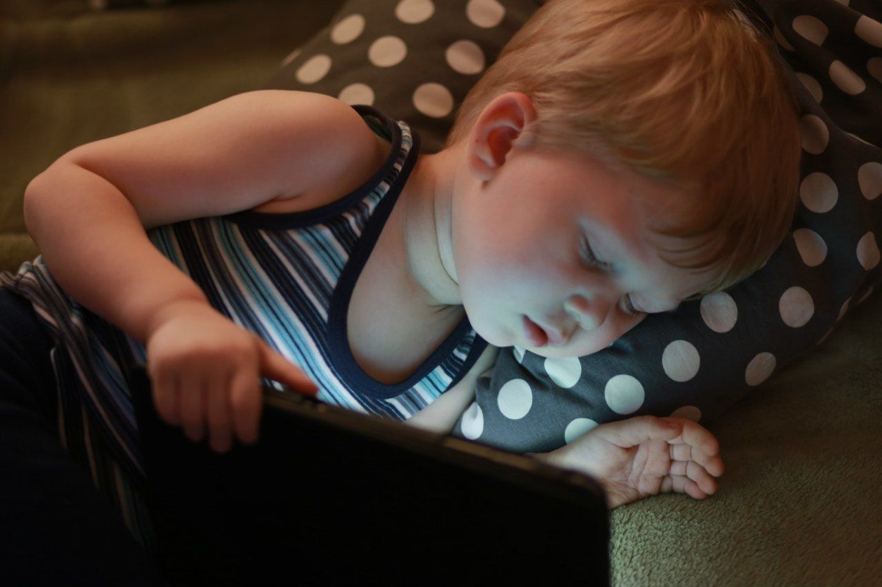Boy holding tablet