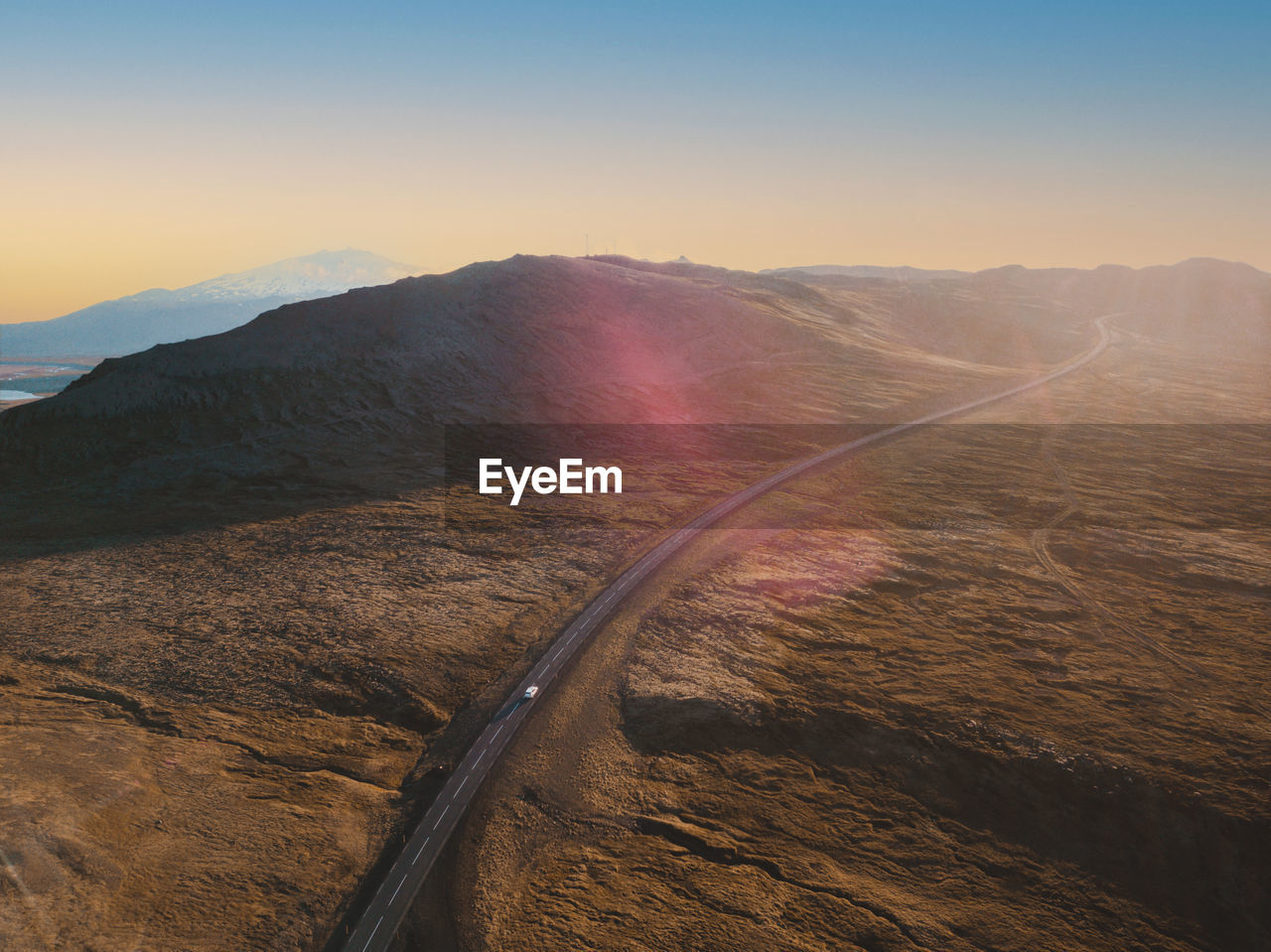 High angle view over scenic road in iceland with one car on the road