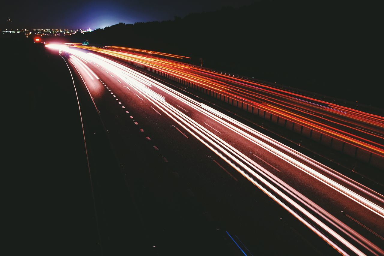light-streaks-on-road-at-night-id-41825934