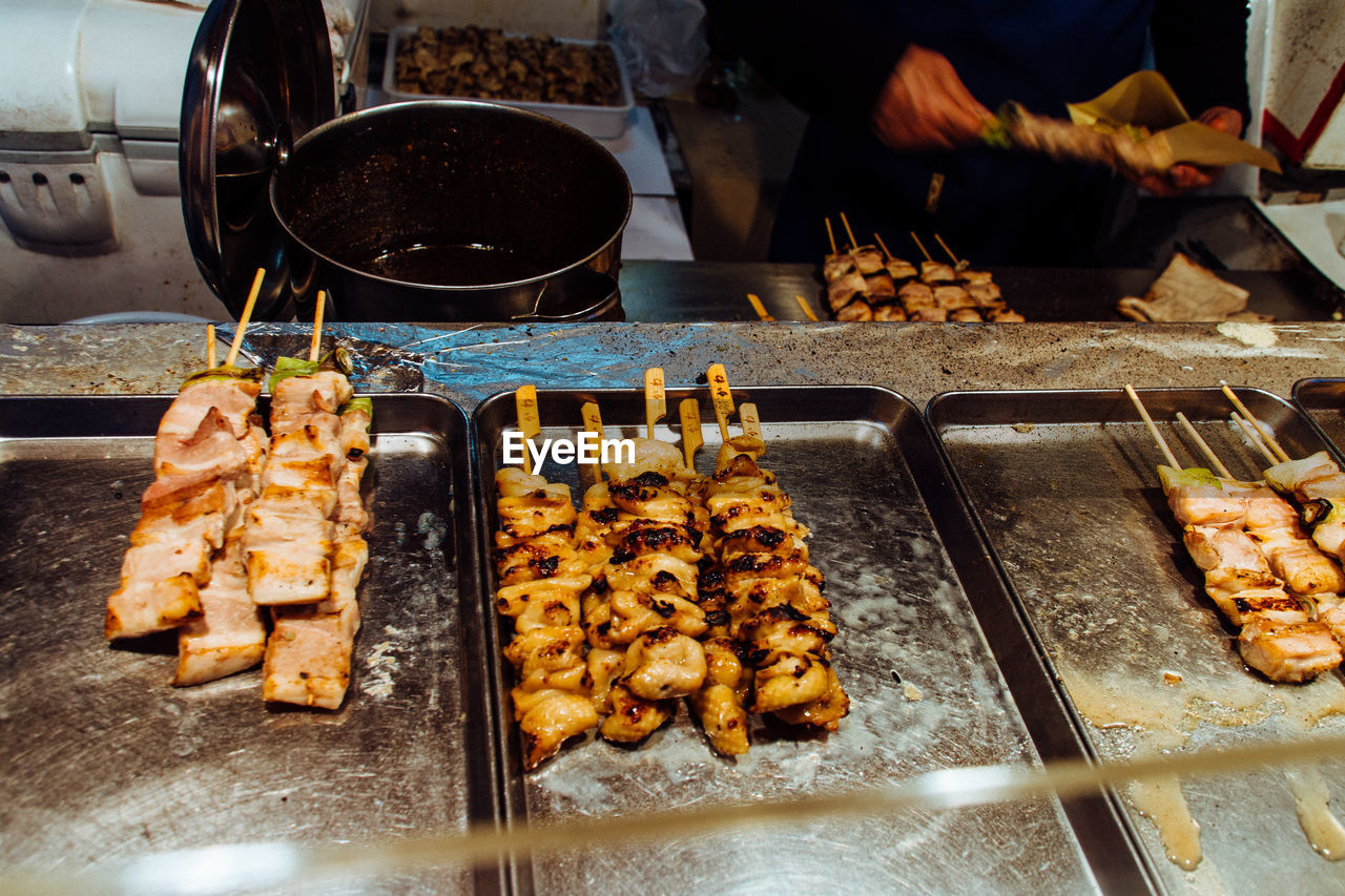 High angle view of yakitori in tray at market stall