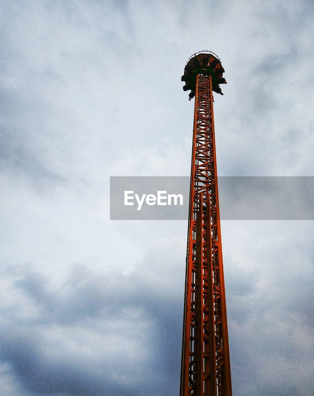LOW ANGLE VIEW OF AMUSEMENT PARK AGAINST SKY